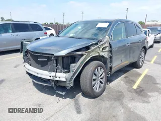 2014 Acura MDX Tech Pkg with VIN 5FRYD3H47EB010189, listed as a IAAI auction lot 42052320 with 127,225 mi miles. Bid and sale history available at carsss.com. Image 2.