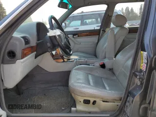 1994 BMW 7 Series z VIN WBAGD4329RDE68127, wystawiony jako Copart lot #70697044 z przebiegiem 179 943 mil mil oraz Czysty tytuł • Clean title. Historia ofert i sprzedaży dostępna na DreamBid. Obrazek 7.
