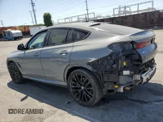 2022 BMW X6 xDrive40i z VIN 5UXCY6C01N9M95573, wystawiony jako Copart lot #54049805 z przebiegiem 24 031 mil mil oraz Szkoda całkowita • Salvage title. Historia ofert i sprzedaży dostępna na DreamBid. Obrazek 2.