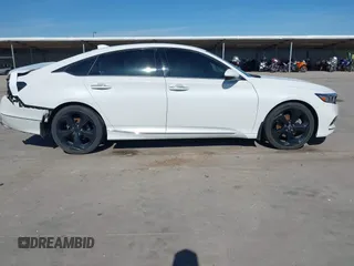 2018 Honda Accord Touring z VIN 1HGCV1F96JA144076, wystawiony jako IAAI lot #41561688 z przebiegiem 125 539 mil mil oraz . Historia ofert i sprzedaży dostępna na DreamBid. Obrazek 13.