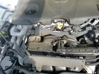 2023 Toyota Camry SE z VIN 4T1G11AK8PU733882, wystawiony jako Copart lot #69398245 z przebiegiem 62 155 mil mil oraz Szkoda całkowita • Salvage title. Historia ofert i sprzedaży dostępna na DreamBid. Obrazek 14.