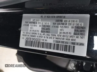 2021 Mazda CX-5 Signature with VIN JM3KFBEY5M0432033, listed as a IAAI auction lot 41607215 with 49,870 mi miles. Bid and sale history available at carsss.com. Image 9.