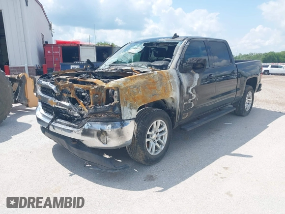 2017 Chevrolet Silverado 1500 LT with VIN 3GCUKREC2HG333665, listed as a IAAI auction lot 42238465 with 189,000 mi miles and . Bid and sale history available at DreamBid. Image 2.