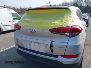 2018 Hyundai Tucson SE z VIN KM8J2CA44JU644303, wystawiony jako IAAI lot #42059326 z przebiegiem 67 873 mil mil oraz . Historia ofert i sprzedaży dostępna na DreamBid. Obrazek 6.