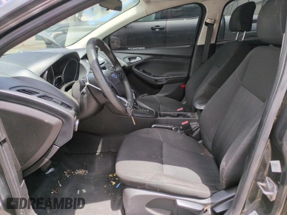 2015 Ford Focus SE with VIN 1FADP3F29FL328828, listed as a Copart auction lot 56420505 with 149,675 mi miles and Salvage title. Bid and sale history available at DreamBid. Image 7.