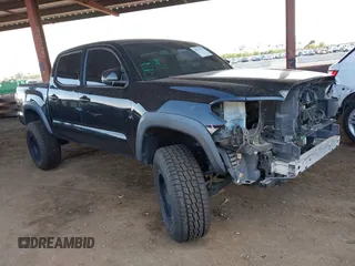 2016 Toyota Tacoma SR with VIN 5TFCZ5AN6GX046167, listed as a IAAI auction lot 41975077 with 128,132 mi miles and . Bid and sale history available at DreamBid. Image 1.