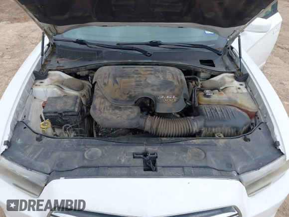 2014 Dodge Charger SE with VIN 2C3CDXBG4EH186881, listed as a IAAI auction lot 41952966 with 206,057 mi miles and . Bid and sale history available at DreamBid. Image 10.