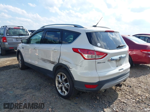 2015 Ford Escape Titanium with VIN 1FMCU9J90FUA05005, listed as a IAAI auction lot 42501764 with 121,993 mi miles and . Bid and sale history available at DreamBid. Image 3.