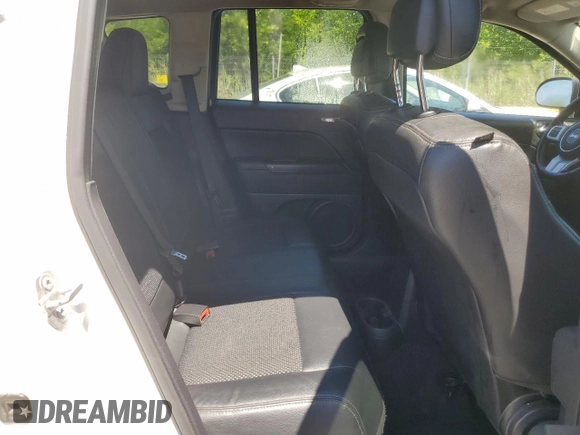 2016 Jeep Compass Sport z VIN 1C4NJCBA7GD740089, wystawiony jako Copart lot #65880235 z przebiegiem 157 601 mil mil oraz Czysty tytuł • Clean title. Historia ofert i sprzedaży dostępna na DreamBid. Obrazek 11.