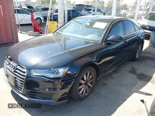 2016 Audi A6 Premium with VIN WAUCFAFC7GN162981, listed as a IAAI auction lot 42660005 with 148,038 mi miles and . Bid and sale history available at DreamBid. Image 2.