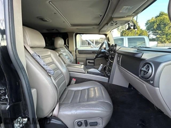2003 Hummer H2 with VIN 5GRGN23U23H145183, listed as a Copart auction lot 84566884 with 85,945 mi miles and Clean Title. Bid and sale history available at carsss.com. Image 5.