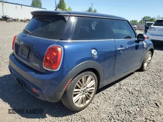 2014 MINI Hardtop S with VIN WMWXM7C51ET926090, listed as a Copart auction lot 55958745 with 148,997 mi miles and Salvage title. Bid and sale history available at DreamBid. Image 3.