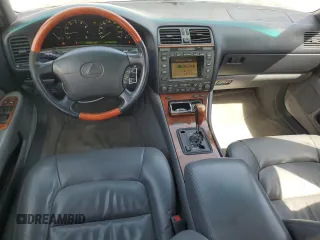 1999 Lexus LS 400 z VIN JT8BH28F0X0161141, wystawiony jako Copart lot #52638575 z przebiegiem 250 602 mil mil oraz Szkody całkowita. Historia ofert i sprzedaży dostępna na DreamBid. Obrazek 8.