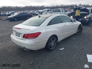 2015 Mercedes-Benz E-Class E 400 with VIN WDDKJ6HB3FF292379, listed as a IAAI auction lot 41838279 with 127,089 mi miles. Bid and sale history available at carsss.com. Image 4.