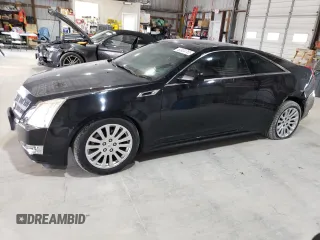 2011 Cadillac CTS Premium with VIN 1G6DS1ED4B0131340, listed as a Copart auction lot 60904765 with 64,792 mi miles and Salvage title. Bid and sale history available at DreamBid. Image 1.