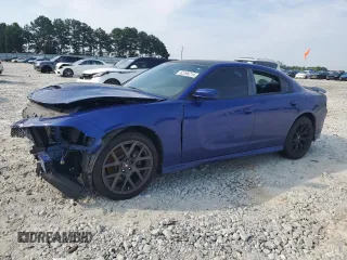 2018 Dodge Charger R/T with VIN 2C3CDXCT6JH221474, listed as a Copart auction lot 62290215 with 124,113 mi miles and Salvage title. Bid and sale history available at DreamBid. Image 1.