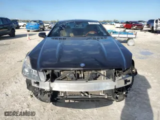 2009 Mercedes-Benz SL-Class V8 with VIN WDBSK71F09F144591, listed as a Copart auction lot 46873785 with 63,977 mi miles and Salvage Title. Bid and sale history available at carsss.com. Image 5.