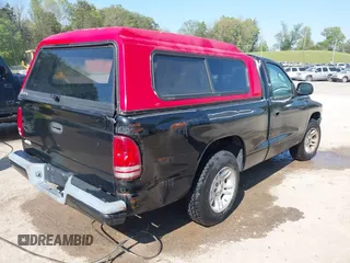 2001 Dodge Dakota with VIN 1B7FL26X71S298506, listed as a IAAI auction lot 42078981 with 193,818 mi miles. Bid and sale history available at carsss.com. Image 4.