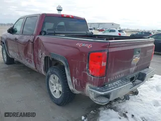 2014 Chevrolet Silverado 1500 LT with VIN 3GCUKRECXEG454259, listed as a IAAI auction lot 41300279 with 152,701 mi miles. Bid and sale history available at carsss.com. Image 3.