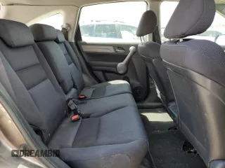 2009 Honda CR-V LX z VIN 5J6RE48399L025855, wystawiony jako Copart lot #60359355 z przebiegiem 262 261 mil mil oraz Czysty tytuł • Clean title. Historia ofert i sprzedaży dostępna na DreamBid. Obrazek 11.
