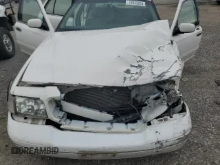 2000 Ford Crown Victoria LX z VIN 2FAFP74W4YX120352, wystawiony jako Copart lot #79833264 z przebiegiem Nie podano mil oraz Szkoda całkowita • Salvage title. Historia ofert i sprzedaży dostępna na DreamBid. Obrazek 11.