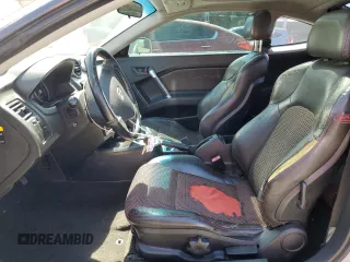 2006 Hyundai Tiburon GT z VIN KMHHN65F26U225506, wystawiony jako Copart lot #56997285 z przebiegiem 170 175 mil mil oraz Szkody całkowita. Historia ofert i sprzedaży dostępna na DreamBid. Obrazek 7.