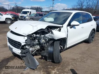 2016 Porsche Cayenne with VIN WP1AA2A26GLA02503, listed as a IAAI auction lot 41684700 with 90,495 mi miles. Bid and sale history available at carsss.com. Image 2.