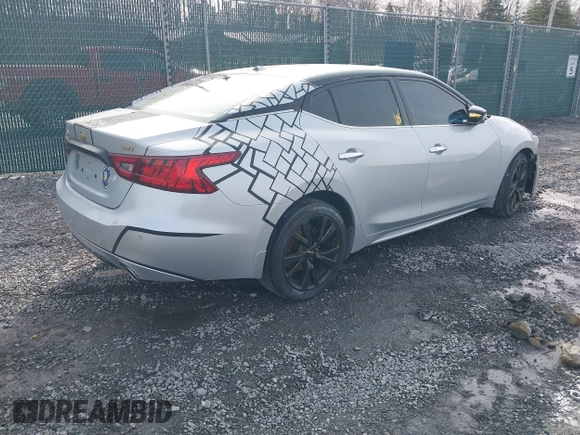 2017 Nissan Maxima Platinum with VIN 1N4AA6AP1HC411729, listed as a IAAI auction lot 41002595 with 98,934 mi miles and . Bid and sale history available at DreamBid. Image 4.