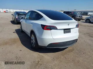 2021 Tesla Model Y Long Range with VIN 5YJYGDEE4MF122362, listed as a IAAI auction lot 42096138 with 47,006 mi miles and . Bid and sale history available at DreamBid. Image 3.