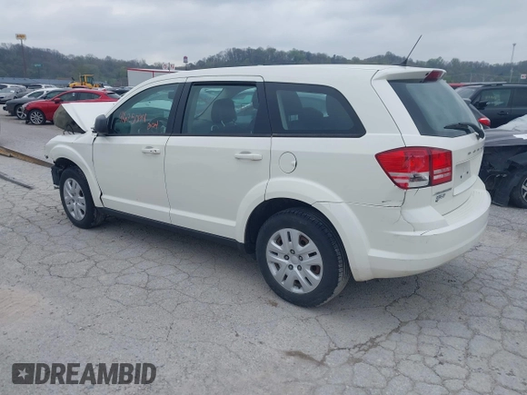 2014 Dodge Journey SE with VIN 3C4PDCAB7ET134454, listed as a IAAI auction lot 41966206 with 145,814 mi miles and . Bid and sale history available at DreamBid. Image 3.
