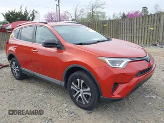 2016 Toyota RAV4 LE with VIN 2T3BFREV6GW516014, listed as a IAAI auction lot 41940997 with 74,129 mi miles. Bid and sale history available at carsss.com. Image 1.