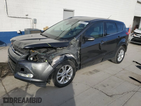 2015 Ford Escape Titanium with VIN 1FMCU9J93FUA28794, listed as a Copart auction lot 50655305 with 112,105 mi miles and Salvage title. Bid and sale history available at DreamBid. Image 1.