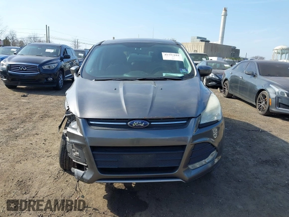 2013 Ford Escape SE with VIN 1FMCU9GX8DUD58286, listed as a IAAI auction lot 41797161 with 189,467 mi miles. Bid and sale history available at carsss.com. Image 12.