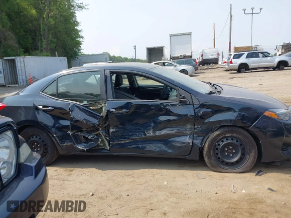 2018 Toyota Corolla L with VIN 2T1BURHE1JC052651, listed as a IAAI auction lot 42430958 with 104,664 mi miles and . Bid and sale history available at DreamBid. Image 13.