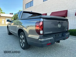 2019 Honda Ridgeline RTL-E with VIN 5FPYK3F71KB009532, listed as a Copart auction lot 65827935 with 217,177 mi miles and Clean title. Bid and sale history available at DreamBid. Image 3.