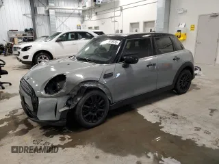 2023 MINI Hardtop 4 Door Cooper Classic with VIN WMW33DK0XP2S54786, listed as a Copart auction lot 87873415 with 50,956 mi miles and Salvage Title. Bid and sale history available at DreamBid. Image 1.