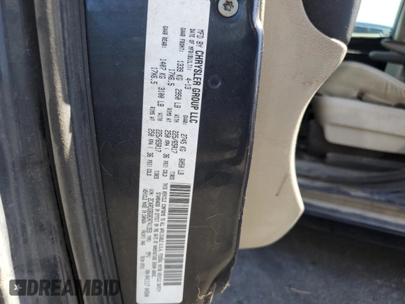 2013 Dodge Grand Caravan SE with VIN 2C4RDGBG8DR741359, listed as a Copart auction lot 52810065 with 103,735 mi miles and Salvage Title. Bid and sale history available at DreamBid. Image 13.