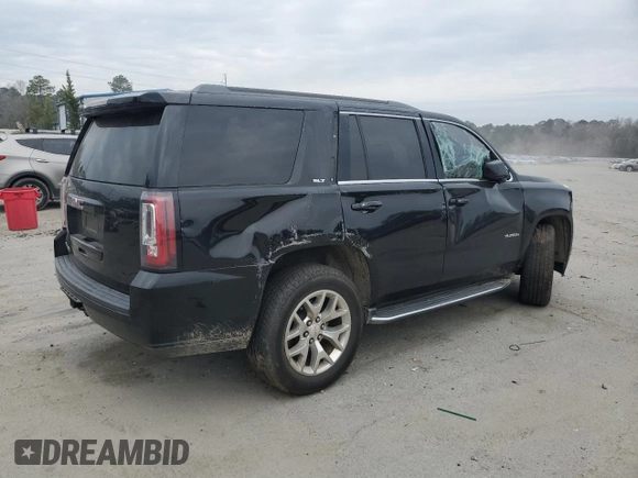 2015 GMC Yukon SLT with VIN 1GKS1BKC1FR615562, listed as a Copart auction lot 46374135 with 141,207 mi miles and Salvage Title. Bid and sale history available at carsss.com. Image 3.