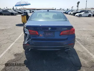 2018 BMW 5 Series 540i with VIN WBAJE5C51JWA94673, listed as a Copart auction lot 59807825 with 77,051 mi miles and Salvage title. Bid and sale history available at DreamBid. Image 6.