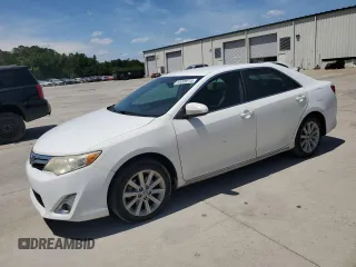 2012 Toyota Camry XLE z VIN 4T1BD1FKXCU052028, wystawiony jako Copart lot #55309515 z przebiegiem 199 316 mil mil oraz Szkoda całkowita • Salvage title. Historia ofert i sprzedaży dostępna na DreamBid. Obrazek 1.