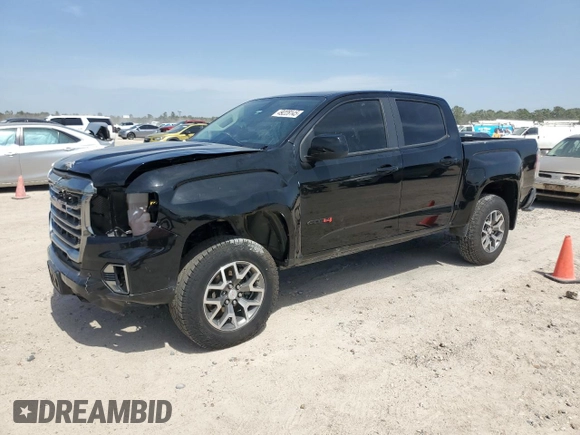 2021 GMC Canyon 4WD AT4 w/Leather with VIN 1GTG6FEN3M1274409, listed as a Copart auction lot 49228145 with 57,194 mi miles and Salvage Title. Bid and sale history available at carsss.com. Image 1.