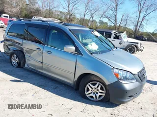 2006 Honda Odyssey EX-L z VIN 5FNRL387X6B108220, wystawiony jako IAAI lot #41737911 z przebiegiem 302 055 mil mil oraz . Historia ofert i sprzedaży dostępna na DreamBid. Obrazek 1.