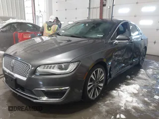 2017 Lincoln MKZ Hybrid Reserve z VIN 3LN6L5MU9HR637908, wystawiony jako IAAI lot #38541395 z przebiegiem 272 691 mil mil oraz . Historia ofert i sprzedaży dostępna na DreamBid. Obrazek 2.