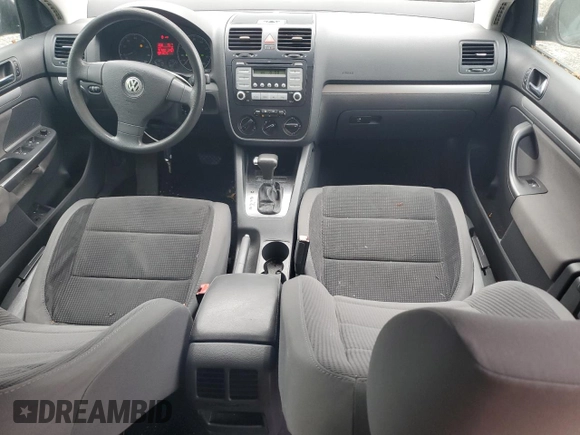 2009 Volkswagen Jetta S z VIN 3VWJZ71K09M010117, wystawiony jako Copart lot #56309165 z przebiegiem 181 692 mil mil oraz Szkoda całkowita • Salvage title. Historia ofert i sprzedaży dostępna na DreamBid. Obrazek 8.