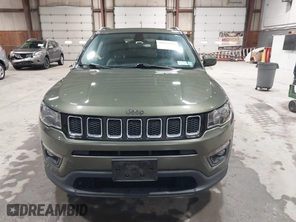 2021 Jeep Compass Latitude with VIN 3C4NJDBB1MT566220, listed as a IAAI auction lot 41816107 with 69,139 mi miles and . Bid and sale history available at DreamBid. Image 12.