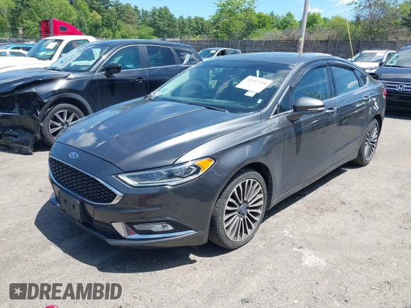2017 Ford Fusion Titanium с VIN 3FA6P0K99HR136596, выставлен на аукционе IAAI как лот 42347238 с пробегом 149 749 миль миль и . История ставок и продаж доступна на DreamBid. Изображение 2.