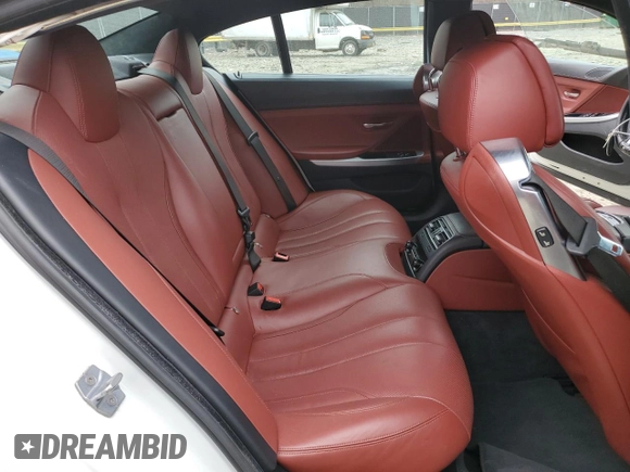 2014 BMW 6 Series 650i xDrive z VIN WBA6B4C54ED371324, wystawiony jako Copart lot #49016325 z przebiegiem 113 395 mil mil oraz Szkoda całkowita • Salvage title. Historia ofert i sprzedaży dostępna na DreamBid. Obrazek 10.