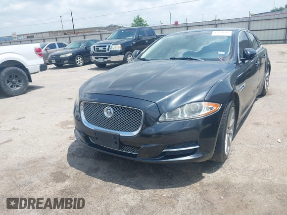 2013 Jaguar XJ with VIN SAJWA1C77D8V44610, listed as a IAAI auction lot 42150382 with Not Provided miles and . Bid and sale history available at DreamBid. Image 6.