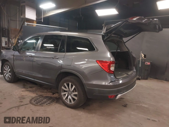 2019 Honda Pilot EX-L with VIN 5FNYF6H57KB062293, listed as a IAAI auction lot 41936964 with 93,012 mi miles and . Bid and sale history available at DreamBid. Image 3.
