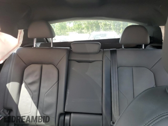 2021 Audi Q3 Premium with VIN WA1AUCF37M1067054, listed as a Copart auction lot 57299815 with 67,334 mi miles and Salvage title. Bid and sale history available at DreamBid. Image 10.